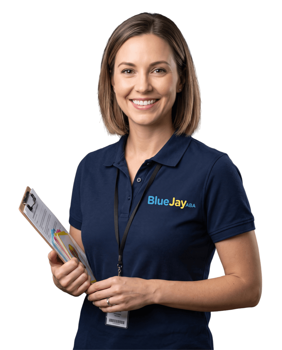 Nicole Fried, Clinical Director at Blue Jay ABA, holding a clipboard
